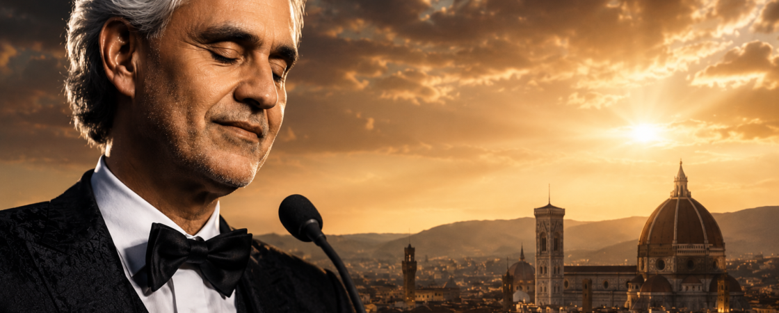 Andrea Bočeli u elegantnom crnom odelu sa leptir-mašnom, pored mikrofona, dok iza njega zalazi sunce iznad Firence.